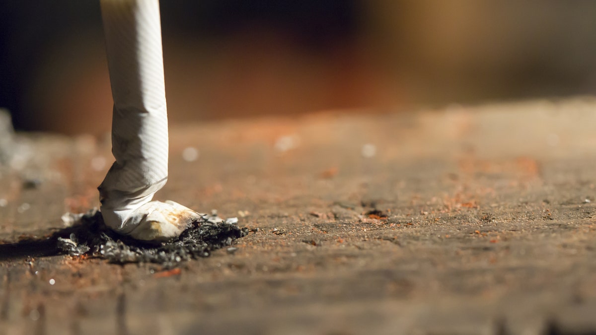 put out a cigarette quit smoking istock large