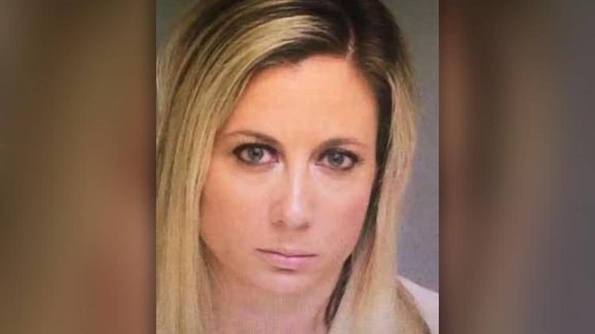 Married teacher, mom, 31, surrenders to police amid accusations of sex with four teen boy students Fox News photo