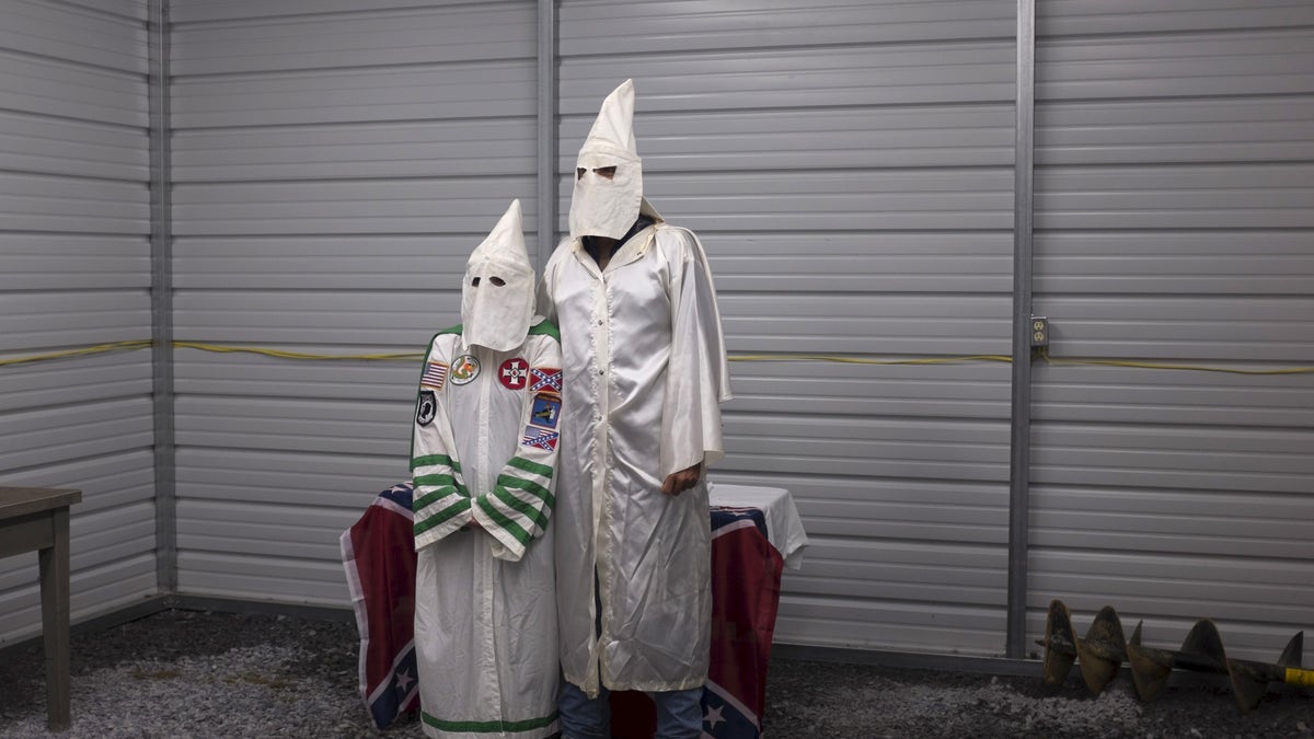 Male and female members of the Virgil Griffin White Knights, a group that claims affiliation with the Ku Klux Klan, pose for a photo in robes before a cross-lighting ceremony at a private farmhouse in Carter County, Tennessee, 2015. According to the Southern Poverty Law Center, an organization that monitors extremist groups, the Ku Klux Klan, which had about 6 million members in the 1920s, now has about 72 chapters across the country. In other words, it has about 2,000 to 3,000 members, including Klavern.Reuters/Johnny Milano 29 of 34 photos of him for wider image stories "Inside the Ku Klux Klan"search "Milan Co., Ltd." For all photos - RTX1KJWX