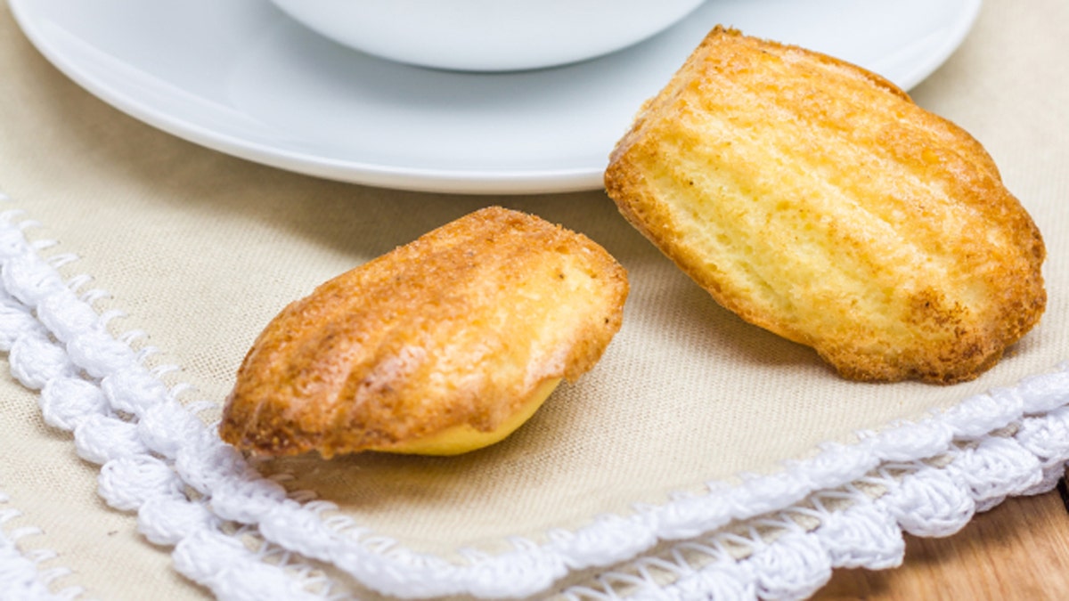 Homemade madeleines with a cup of coffee