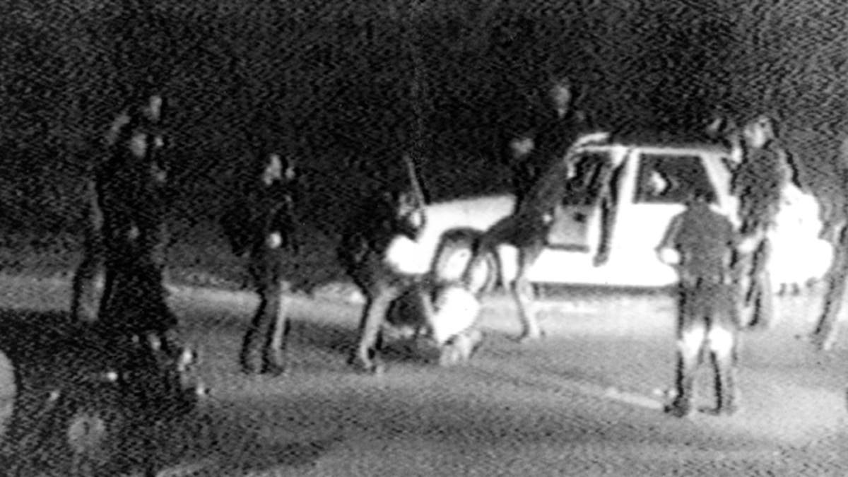 March 31, 1991: FILE - This image made from video shot by George Holliday shows police officers beating a man, later identified as Rodney King.