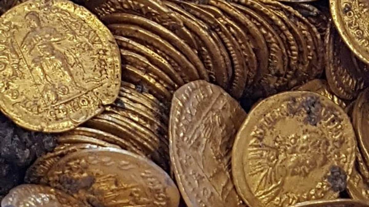 Huge hoard of Roman gold coins discovered in Italian theater