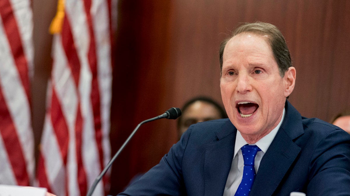 Sen. Ron Wyden, D-Ore., the top Democrat on the Senate Finance Committee speaks during a House and Senate conference after GOP leaders announced they have forged an agreement on a sweeping overhaul of the nation's tax laws, on Capitol Hill in Washington, Wednesday, Dec. 13, 2017. Democrats objected to the bill and asked that a final vote be delayed until Sen.-elect Doug Jones of Alabama is seated. (AP Photo/Andrew Harnik)