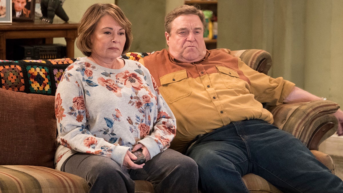 FILE - In this image released by ABC, Roseanne Barr, left, and John Goodman appear in a scene from the reboot of 