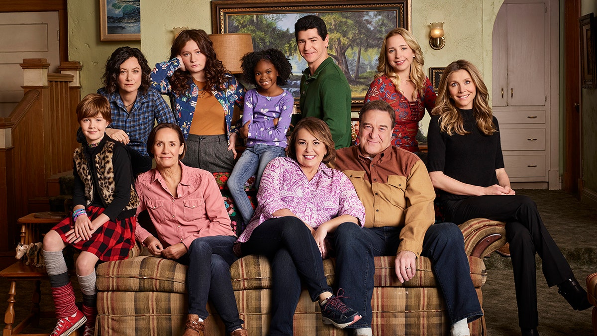 "Roseanne" stars Ames McNamara as Mark, Sara Gilbert as Darlene Conner, Laurie Metcalf as Jackie Harris, Emma Kenney as Harris Conner, Jayden Rey as Mary, Roseanne Barr as Roseanne Conner, Michael Fishman as D.J. Conner, John Goodman as Dan Conner, Lecy Goranson as Becky Conner, and Sarah Chalke as Andrea