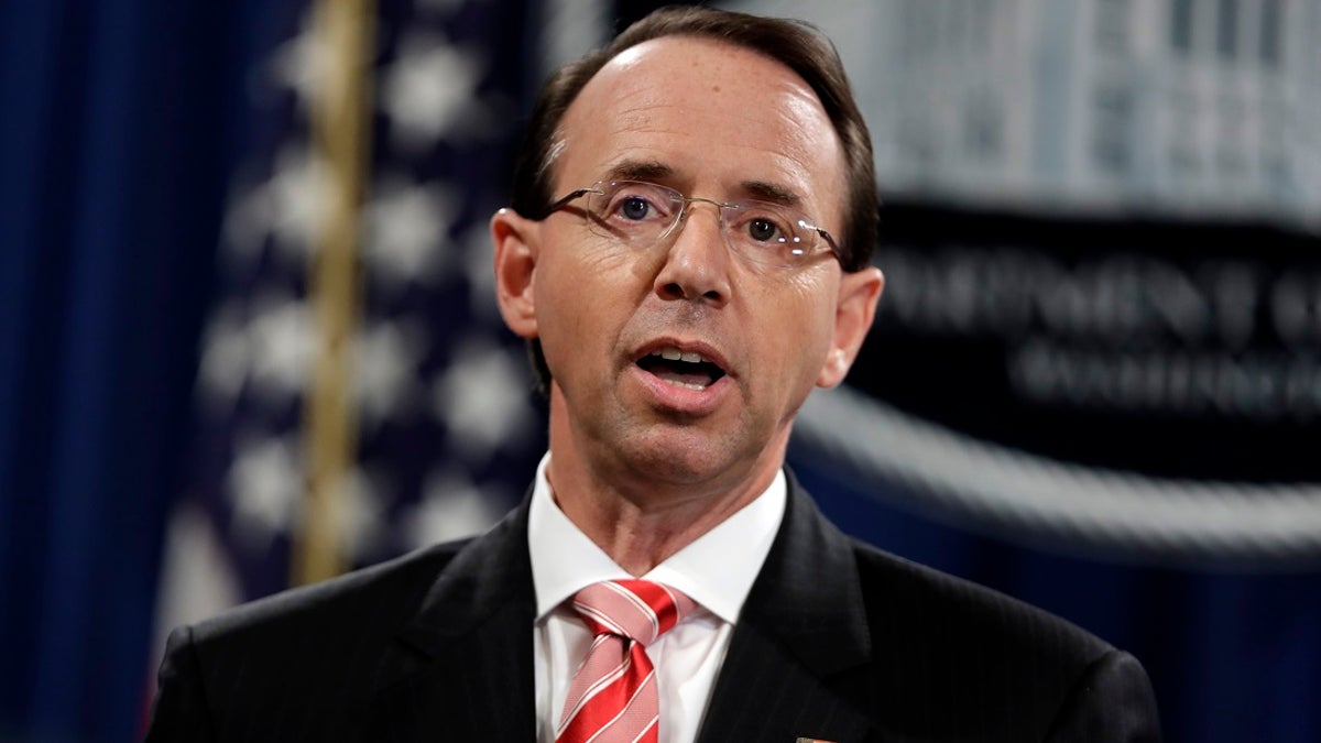 Deputy Attorney General Rod Rosenstein speaks during a news conference at the Department of Justice, Friday, July 13, 2018, in Washington. (AP Photo/Evan Vucci)