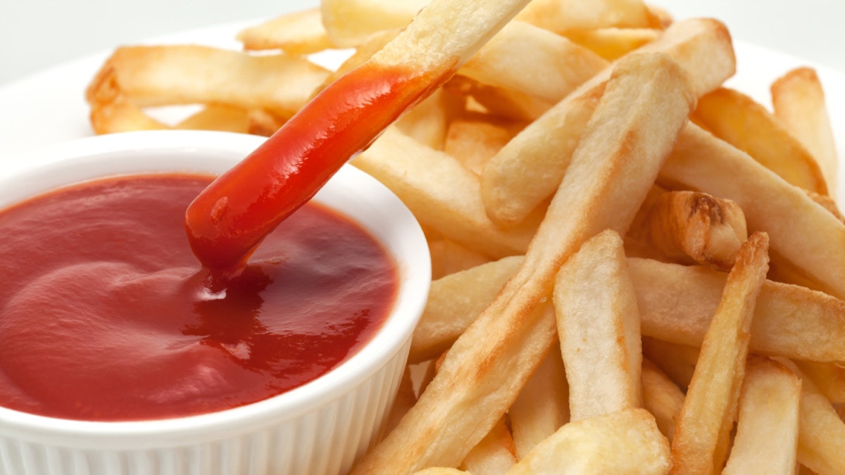 Ketchup with french fries dipped