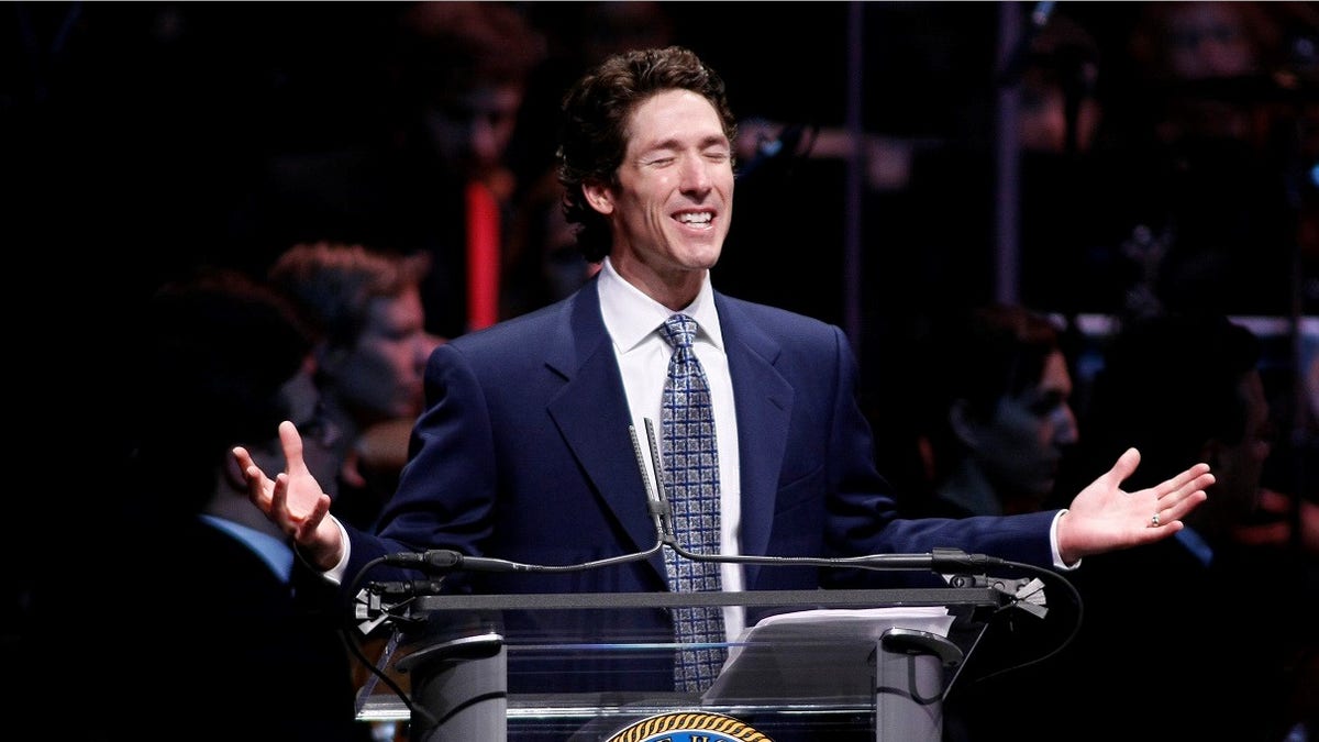 Pastor and best-selling author Joel Osteen gives the invocation before Annise Parker is publicly sworn in as mayor of the United States' fourth largest city in Houston January 4, 2010. Houston on December 12, 2009 became the first major U.S. city to elect an openly gay mayor, Parker, after a hotly contested run-off election that gave gay and lesbian supporters a symbolic victory following defeats over legalizing same-sex marriages in California and Maine. REUTERS/Richard Carson (UNITED STATES - Tags: POLITICS RELIGION) - GM1E61501JM01