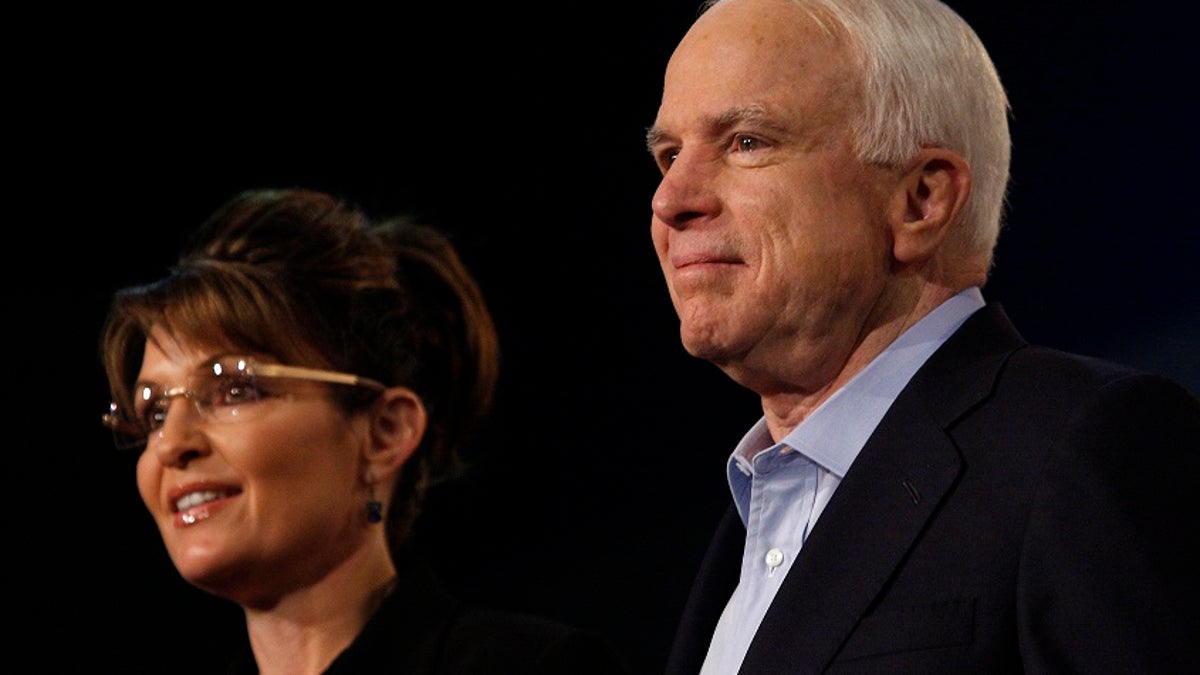 Former Alaska governor and vice presidential candidate Sarah Palin and U.S. Senator John McCain (R-AZ) attend a campaign rally for McCain at Dobson High School in Mesa, Arizona March 27, 2010. McCain who is seeking a fifth term as U.S. Senator received Palin's endorsement yesterday and will challenge JD Hayworth during the Republican primary in August 2010. REUTERS/Joshua Lott (UNITED STATES - Tags: POLITICS) - GM1E63S09CY01