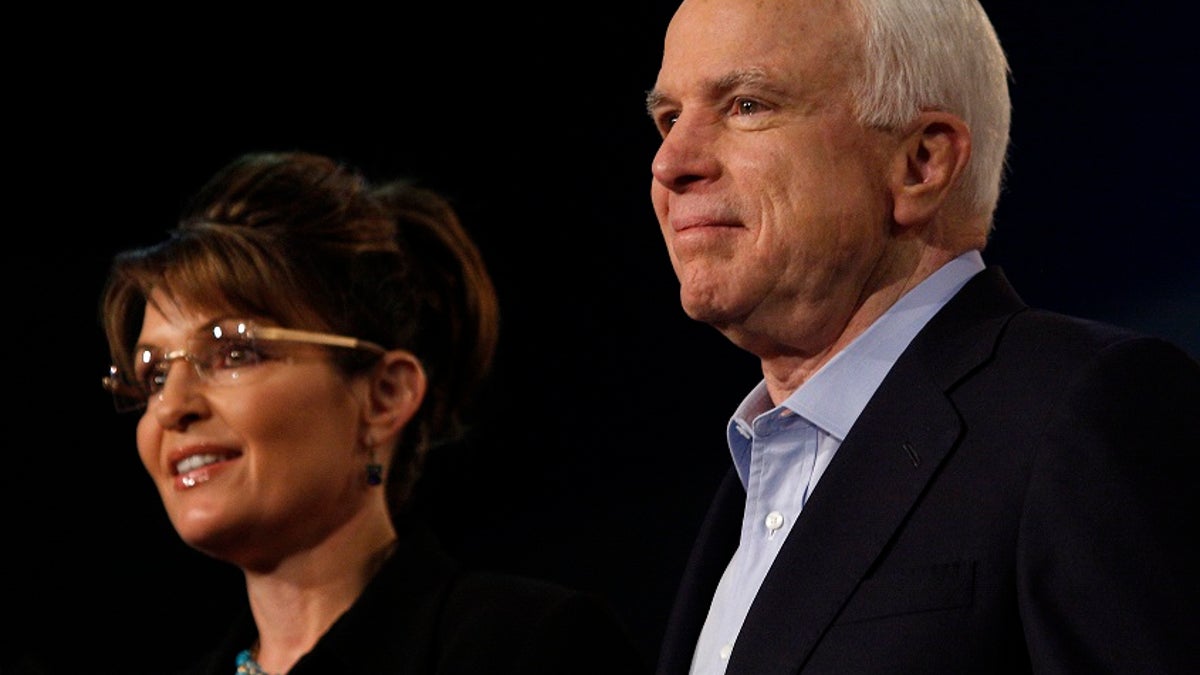 Former Alaska governor and vice presidential candidate Sarah Palin and U.S. Senator John McCain (R-AZ) attend a campaign rally for McCain at Dobson High School in Mesa, Arizona March 27, 2010. McCain who is seeking a fifth term as U.S. Senator received Palin's endorsement yesterday and will challenge JD Hayworth during the Republican primary in August 2010. REUTERS/Joshua Lott (UNITED STATES - Tags: POLITICS) - GM1E63S09CY01