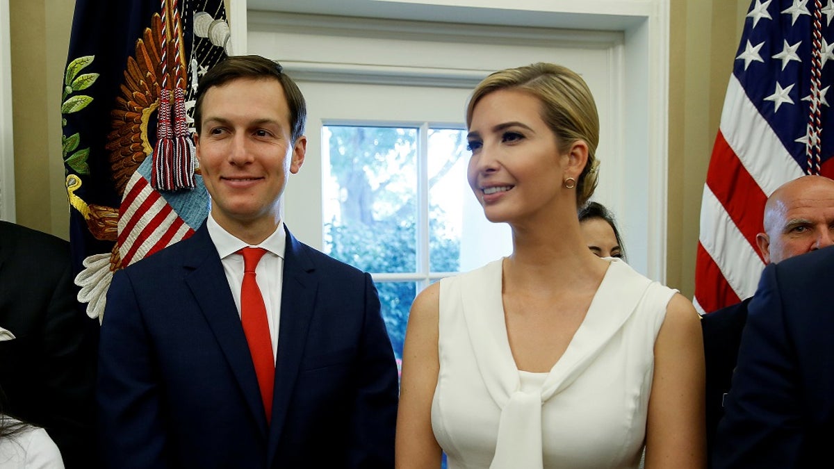 White House Senior Adviser Jared Kushner and Ivanka Trump stand together after John Kelly was sworn in as White House Chief of Staff in the Oval Office of the White House in Washington, U.S., July 31, 2017. REUTERS/Joshua Roberts - RC1EA6A12300