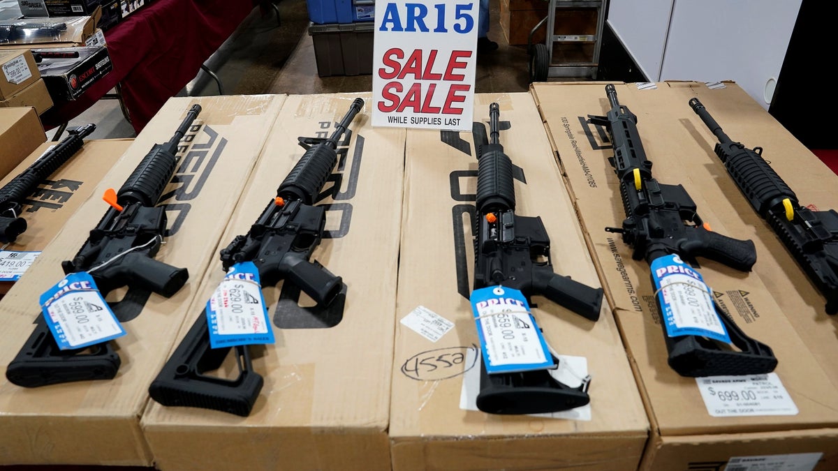 AR-15 rifles are displayed for sale at the Guntoberfest gun show in Oaks, Pennsylvania, U.S., October 6, 2017. REUTERS/Joshua Roberts - RC120D41AB00