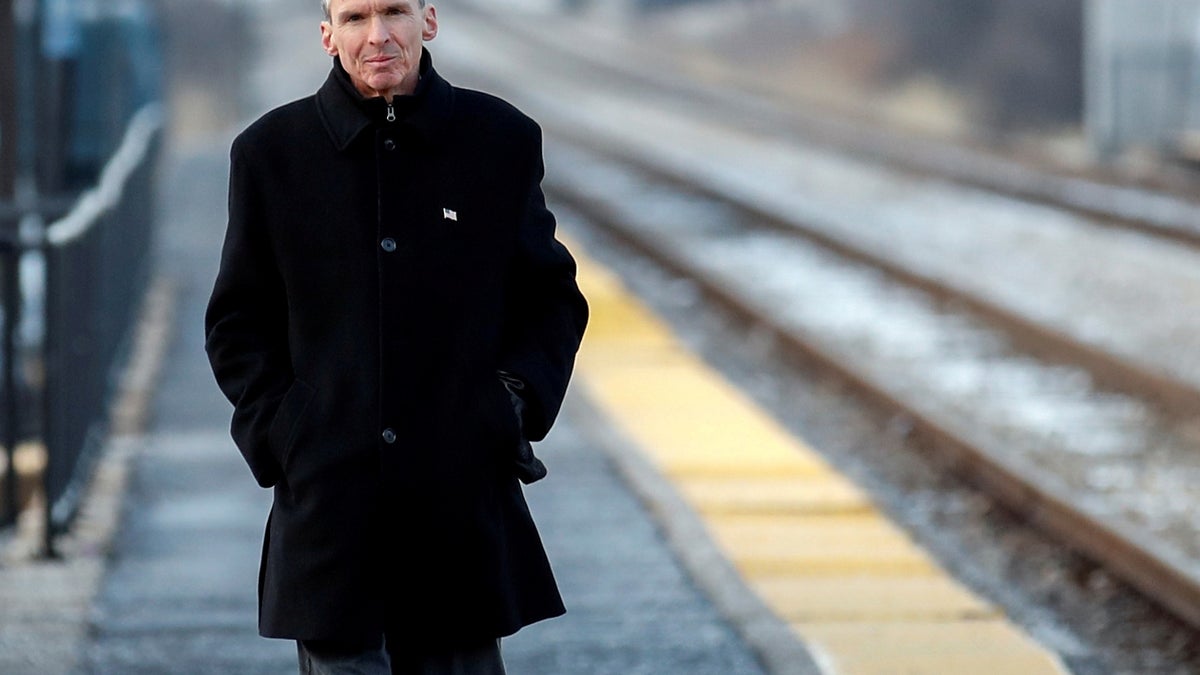 FILE PHOTO: U.S. Congressman Daniel Lipinski arrives at the Chicago Ridge Metra commuter train station before campaigning for re-election in Chicago Ridge, Illinois, U.S. January 25, 2018. Picture taken January 25, 2018. REUTERS/Kamil Krzacznski/File Photo - RC1F5B77DE20