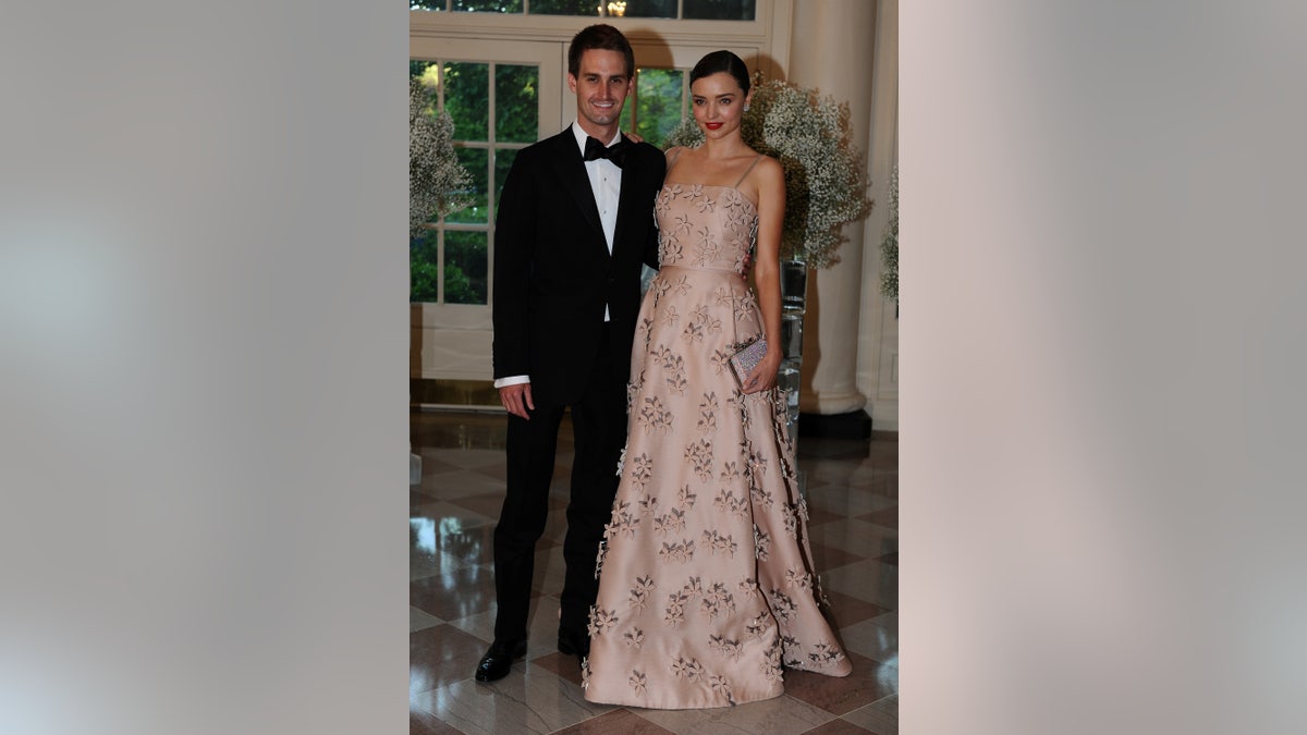 Evan Spiegel, Chief Executive Officer, Snapchat and model Miranda Kerr arrive for the state dinner in honor of the Nordic Summit at the White House in Washington, May 13, 2016. REUTERS/Mary F. Calvert - RTSE8TG