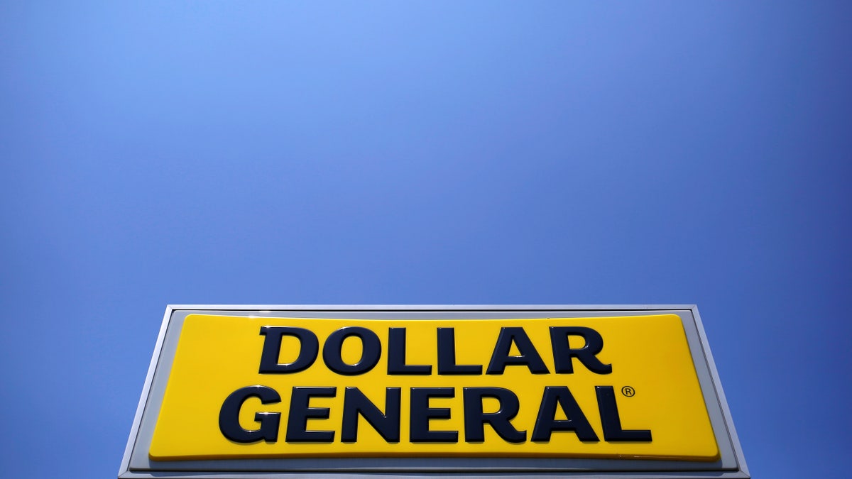 A sign is seen outside a Dollar General store in Chicago, Illinois, U.S. May 23, 2016. REUTERS/Jim Young - RTSFWBZ