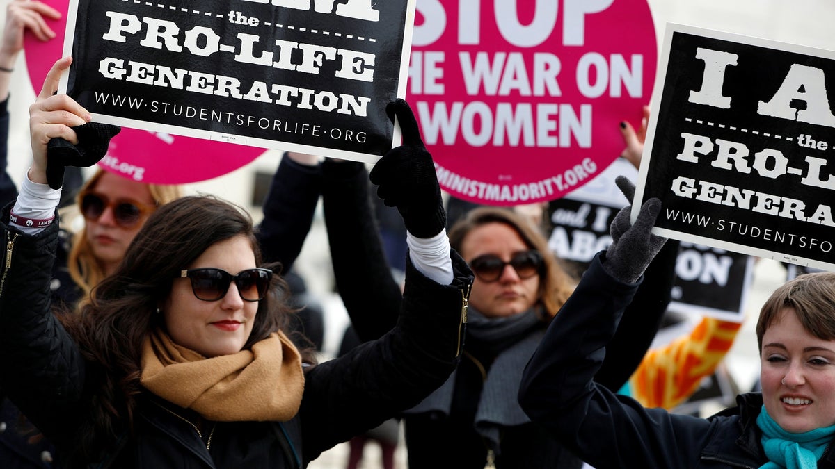 Pro-life activists gather for the National March for Life rally in Washington January 27, 2017.  REUTERS/Aaron P. Bernstein - RC1AFD7066B0