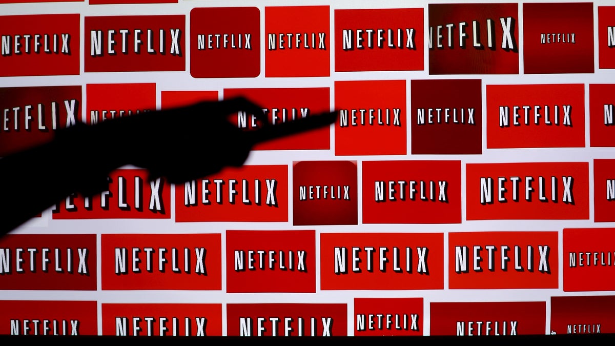 The Netflix logo is shown in this illustration photograph in Encinitas, California October 14, 2014.   REUTERS/Mike Blake/File Photo - RTX2B4O8