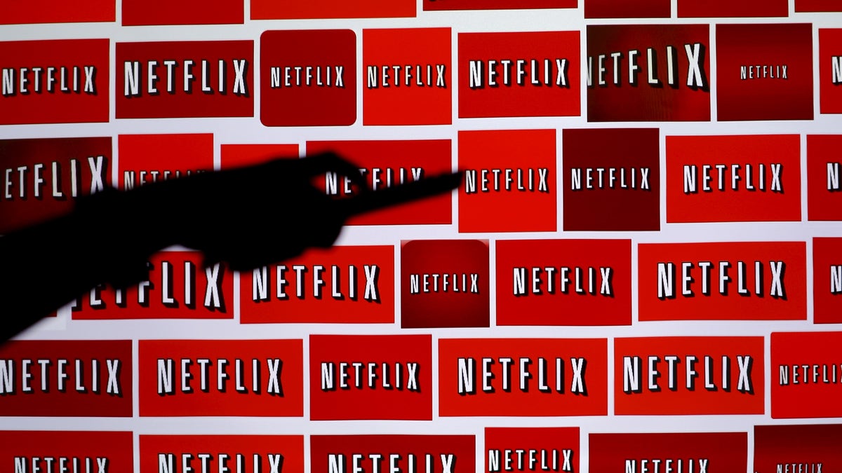 The Netflix logo is shown in this illustration photograph in Encinitas, California October 14, 2014.   REUTERS/Mike Blake/File Photo - RTX2B4O8