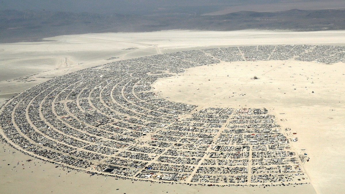 Black Rock City, a gathering of approximately 70,000 people that is created annually for the Burning Man arts and music festival is seen in the Black Rock Desert of Nevada, U.S. September 1, 2017. REUTERS/Jim Bourg FOR USE WITH BURNING MAN RELATED REPORTING ONLY. FOR EDITORIAL USE ONLY. NOT FOR SALE FOR MARKETING OR ADVERTISING CAMPAIGNS. NO THIRD PARTY SALES. NOT FOR USE BY REUTERS THIRD PARTY DISTRIBUTORS - RC19D27E3610