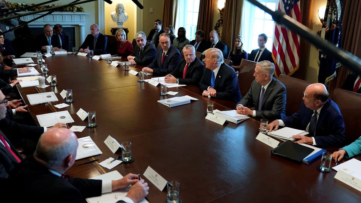 U.S. President Donald Trump speaks to reporters before a cabinet meeting at the White House in Washington, U.S. December 6, 2017. REUTERS/Jonathan Ernst - RC1C34CD0210