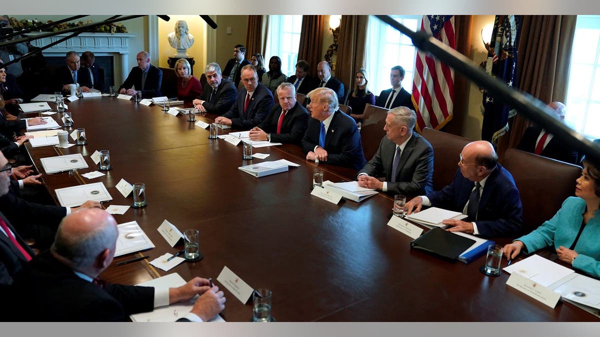 U.S. President Donald Trump speaks to reporters before a cabinet meeting at the White House in Washington, U.S. December 6, 2017. REUTERS/Jonathan Ernst - RC1C34CD0210