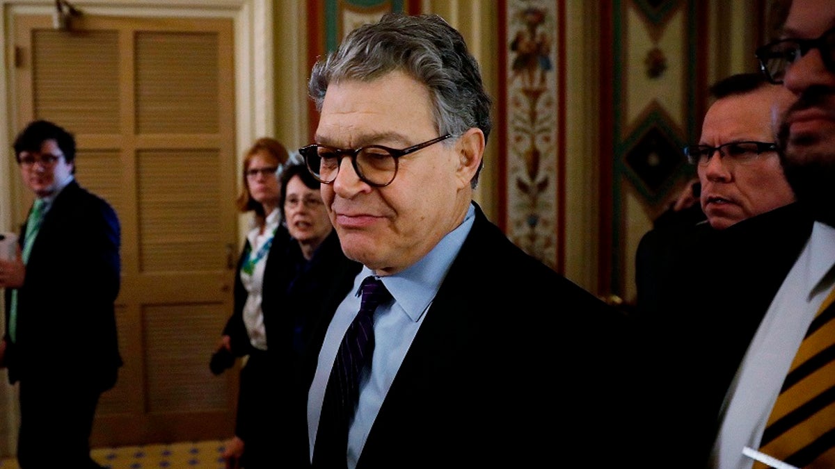 U.S. Senator Al Franken (D-MN) arrives at the U.S. Senate to announce his resignation over allegatons of sexual misconduct on Capitol Hill in Washington, U.S. December 7, 2017. REUTERS/Aaron P. Bernstein - HP1EDC71BC400