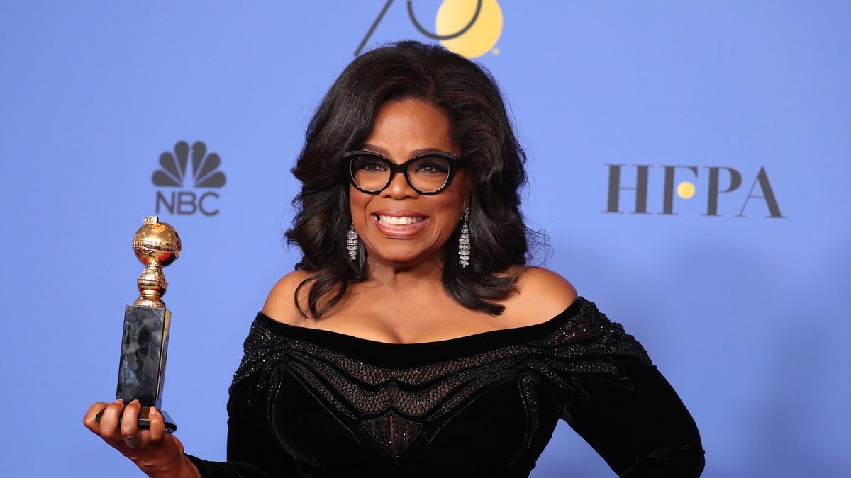 75th Golden Globe Awards  Photo Room  Beverly Hills, California, U.S., 07/01/2018  Oprah Winfrey poses backstage with her Cecil B. DeMille Award. REUTERS/Lucy Nicholson - HP1EE1809MKV2