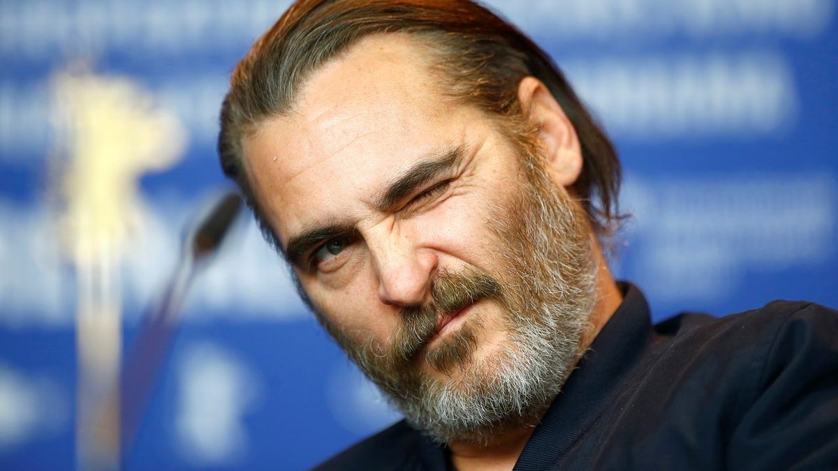 Actor Joaquin Phoenix attends a news conference to promote the movie Don't Worry, He Won't Get Far on Foot at the 68th Berlinale International Film Festival in Berlin, Germany, February 20, 2018. REUTERS/Fabrizio Bensch - UP1EE2K0TQLM5