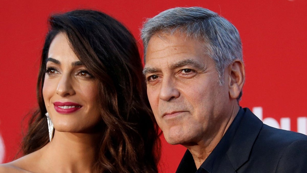 George and Amal Clooney donate $500G to Florida high school
