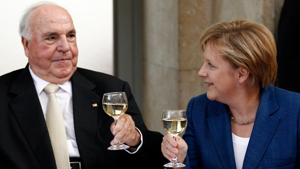 Helmut Kohl and Angela Merkel Reuters