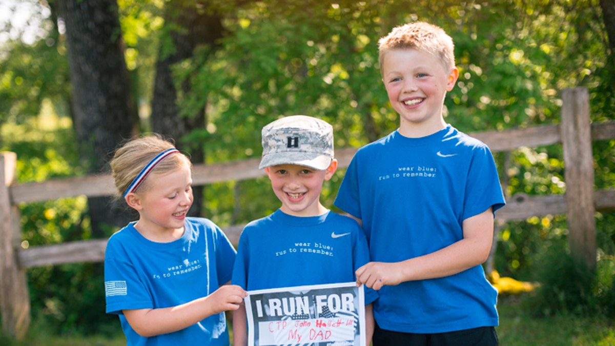 John and Lisa Hallett's children,Heidi, Bryce and Jackson, seen here after a Memorial Day road race, will never forget their dad. (Courtesy: Ingrid Barrentine}