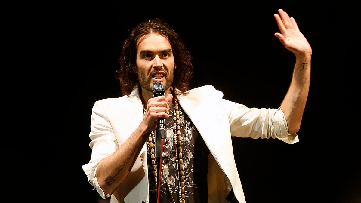 British comedian Russell Brand performs at his Messiah Complex show at Brixton Academy in London March 9, 2014. REUTERS/Olivia Harris (BRITAIN - Tags: ENTERTAINMENT) - RTR3GCSR