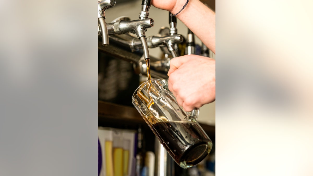 Beer pouring in beer bar