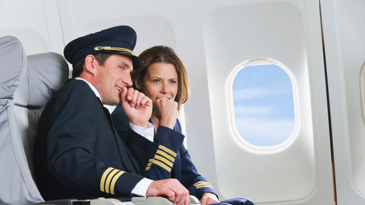 Flight personnel on airplane