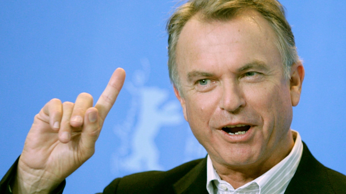 Actor Sam Neill poses during a photocall to present his film 'Angel' running in competition at the 57th Berlinale International Film Festival in Berlin February 17, 2007. The festival runs from February 8-18. REUTERS/Hannibal Hanschke (GERMANY) - RTR1MI9G