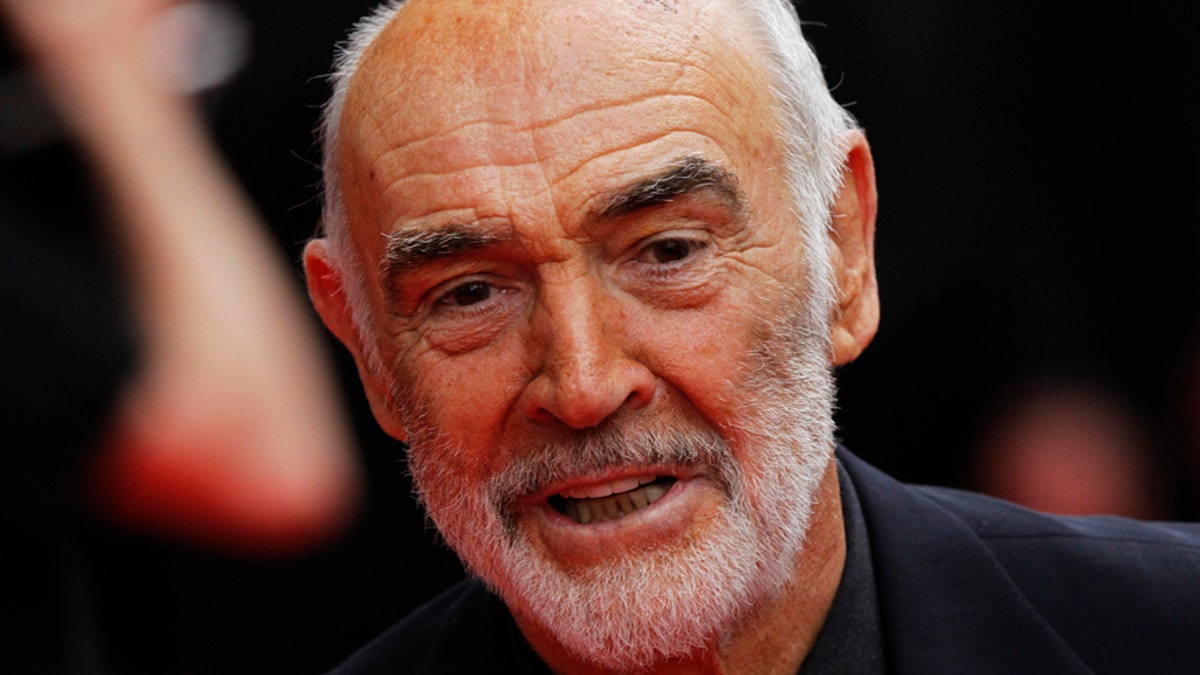 Actor Sean Connery arrives for the Edinburgh International Film Festival opening night showing of the animated movie 'The Illusionist' at the Festival Theatre in Edinburgh, Scotland June 16, 2010. REUTERS/David Moir (BRITAIN - Tags: ENTERTAINMENT HEADSHOT) - RTR2F9EH