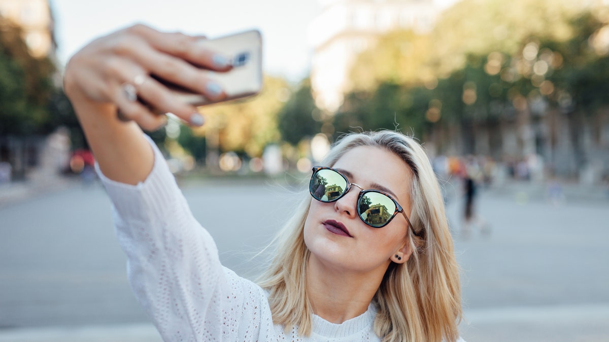 selfie woman millennial istock medium