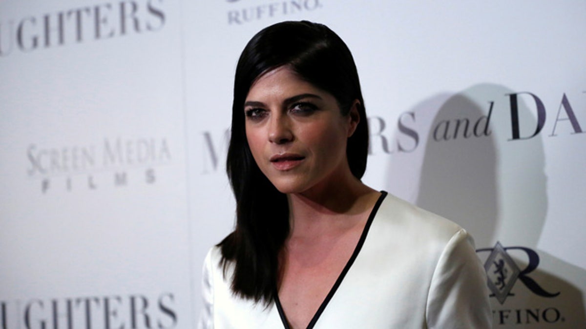 Cast member Selma Blair poses at a premiere for 