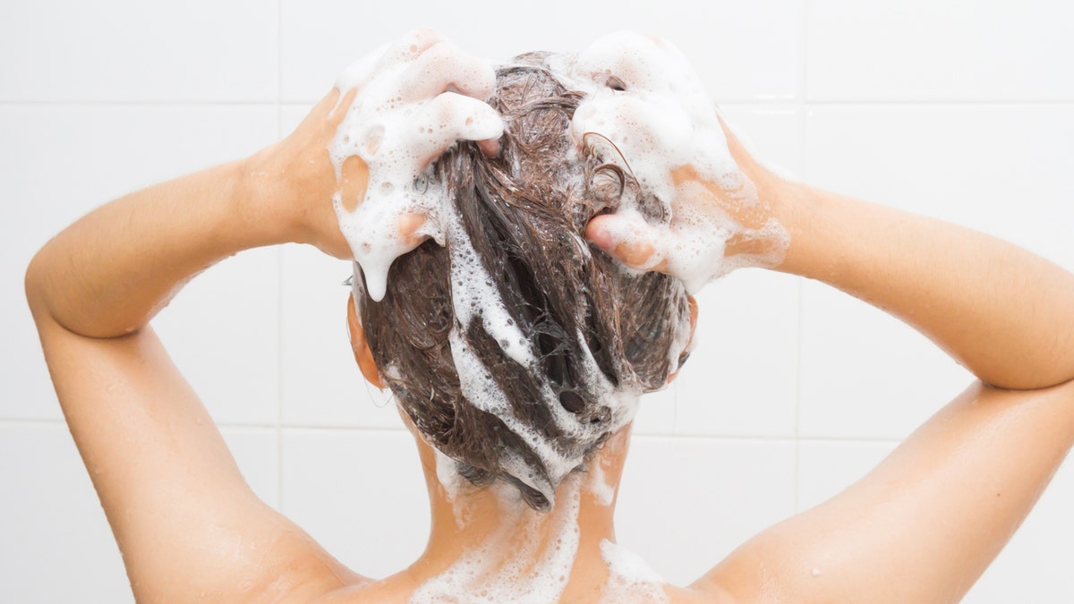 shampoo washing hair istock medium