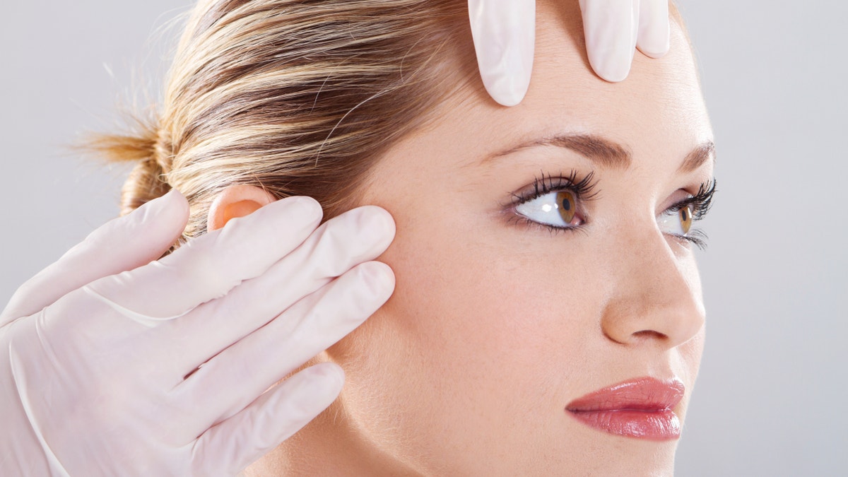 skin check before plastic surgery istock