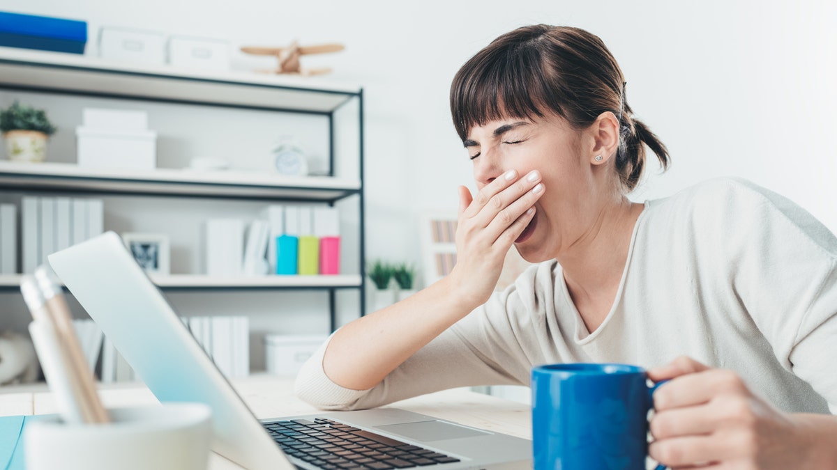 sleepy woman yawn tired woman istock medium