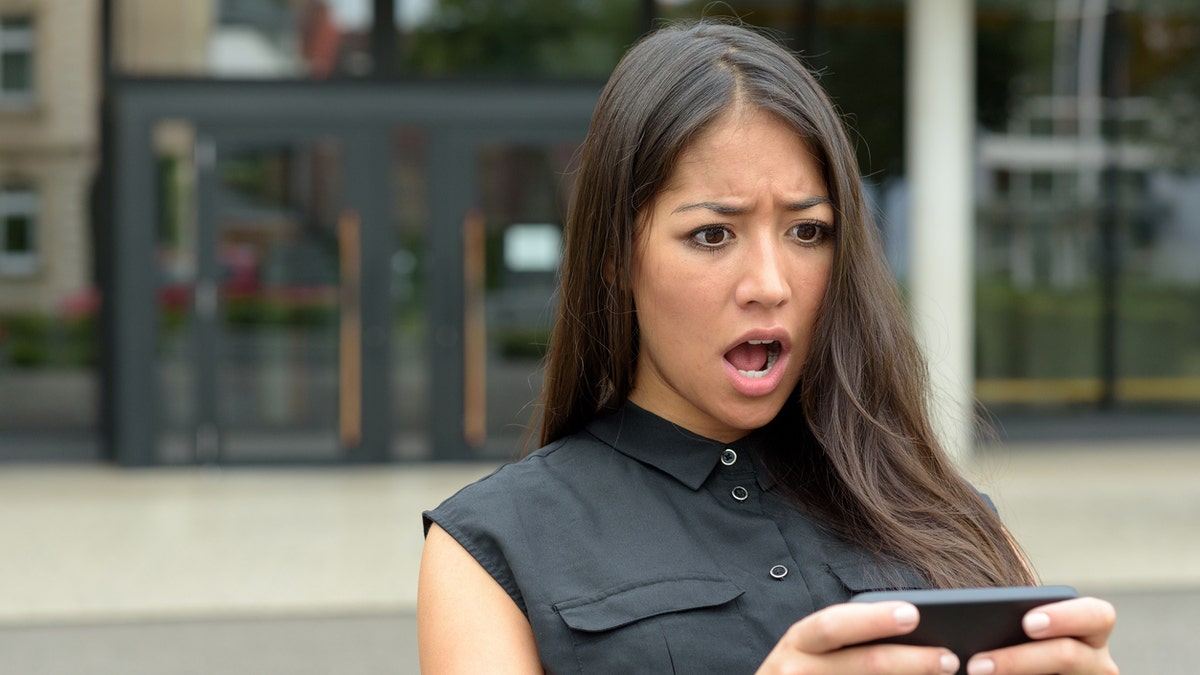 smartphone iphone surprised woman istock medium