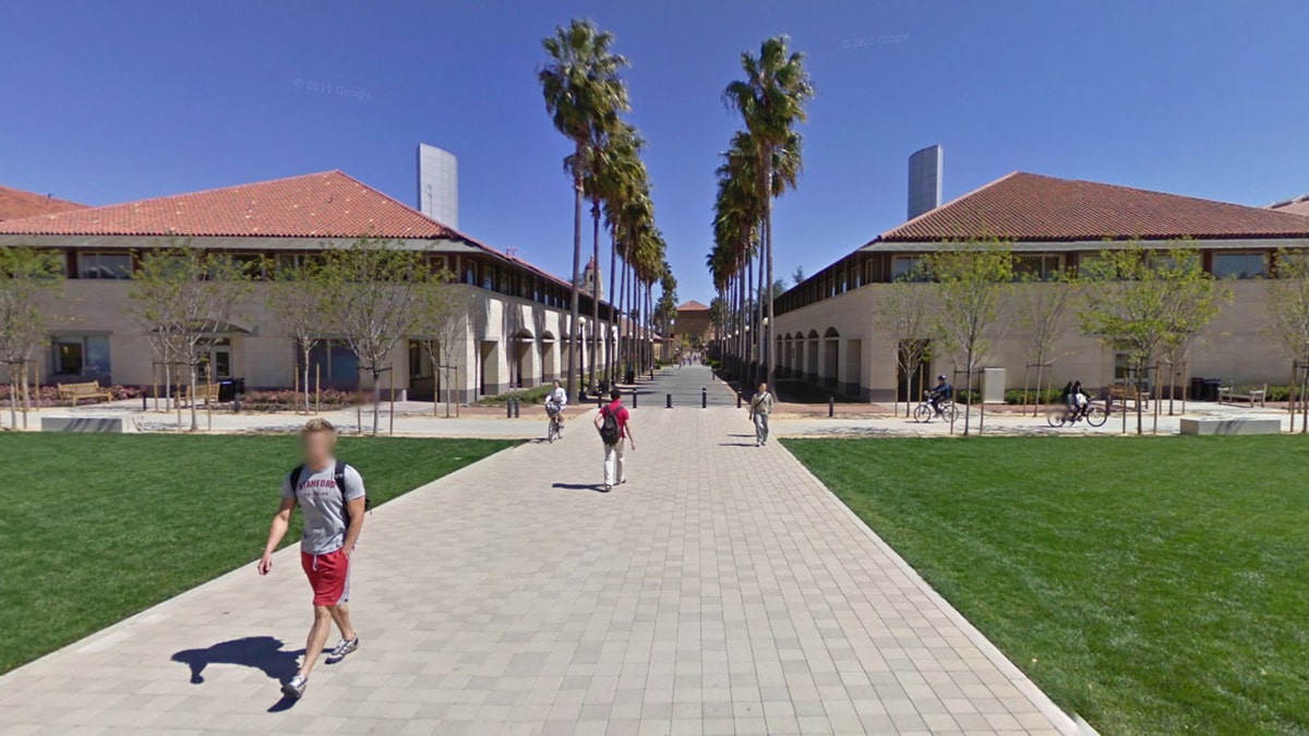 Students walk on the campus of Stanford University in California.