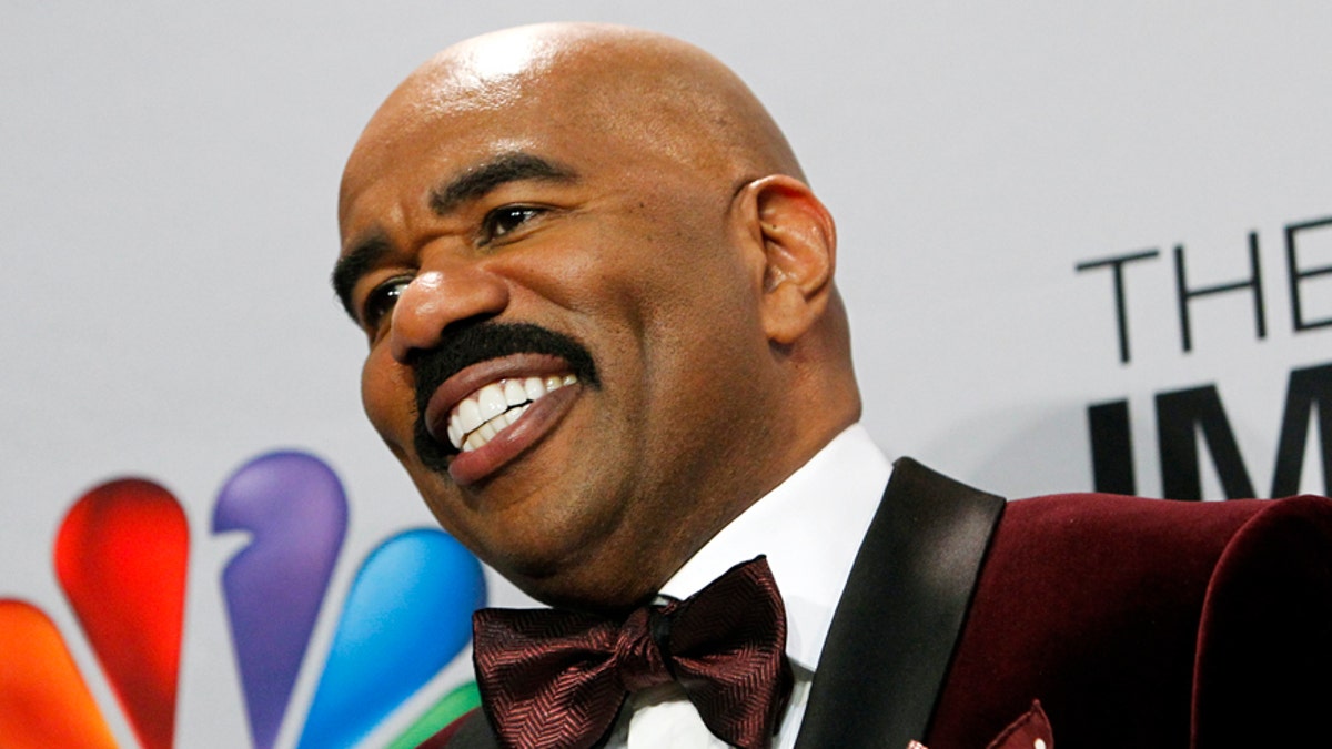 Host Steve Harvey smiles as he poses in the media room at the 44th NAACP Image Awards at the Shrine Auditorium in Los Angeles, California, February 1, 2013. REUTERS/Patrick T. Fallon (UNITED STATES - Tags: ENTERTAINMENT SOCIETY) - RTR3D9BS