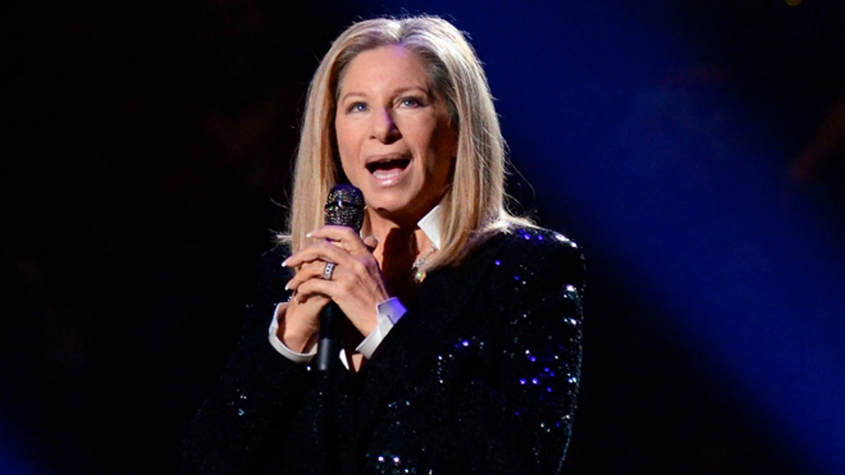 FILE - In this Oct. 11, 2012, file photo, singer Barbra Streisand performs at the Barclays Center in the Brooklyn borough of New York.  Officials say Streisand will serve as chair of a planned performing arts center at the World Trade Center. The announcement was made Thursday, Sept. 8, 2016 at a design-unveiling for the long-stalled project. (Photo by Evan Agostini/Invision/AP, File)