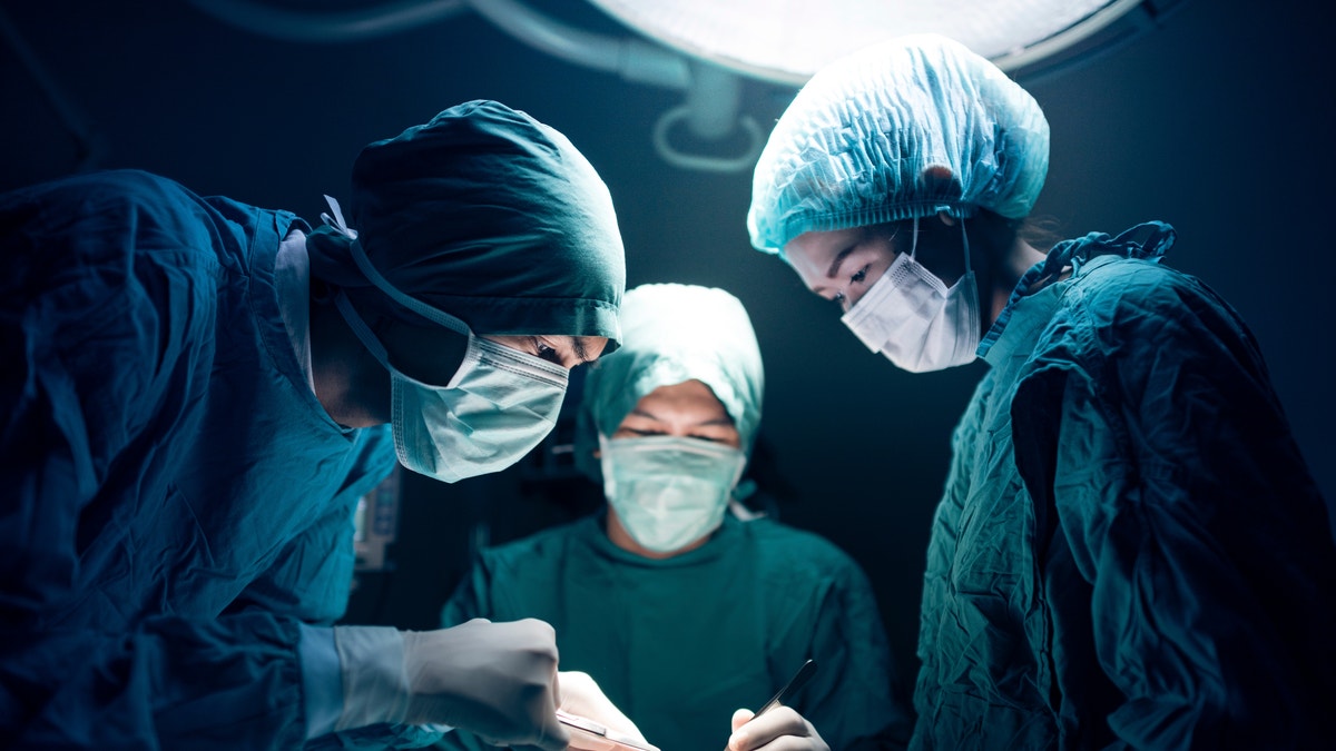 surgeons in surgery istock large