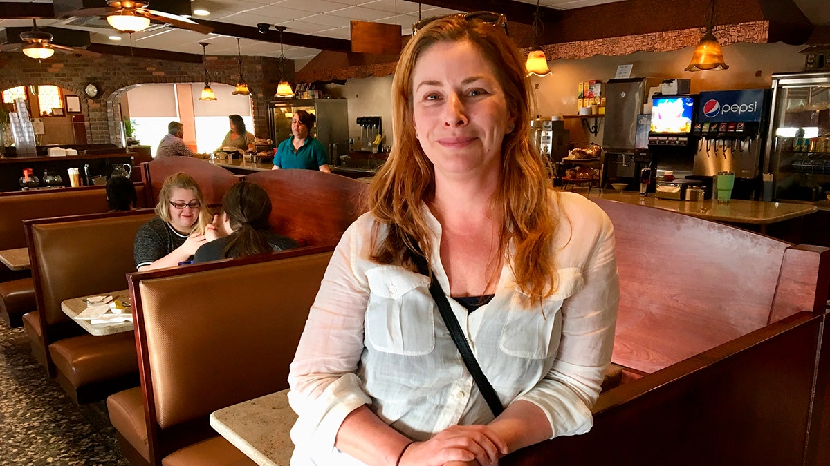 Diane Neal poses at a diner Wednesday, May 2, 2018, during an interview in Kingston, N.Y.,  discussing her campaign for the 19th congressional district. The  former 