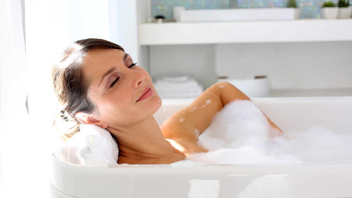 taking a bath taking a bubble bath istock medium