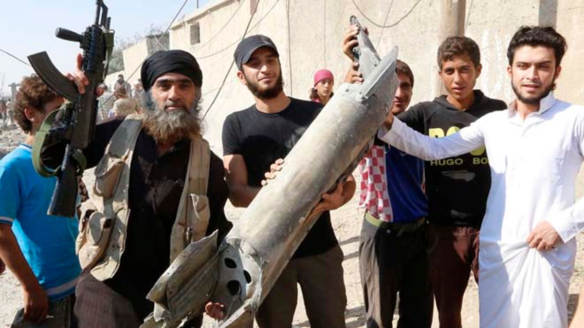 Saingan berdarah: Serangan Paris membantu Al Qaeda mendapatkan keunggulan atas ISIS