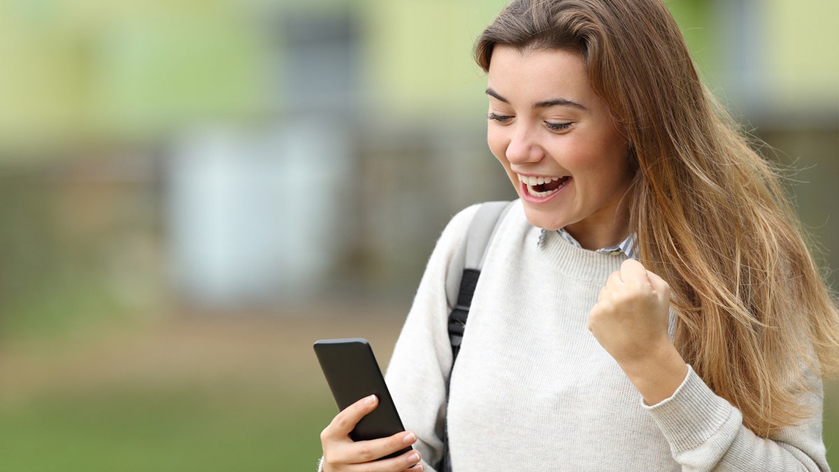 teen girl with phone